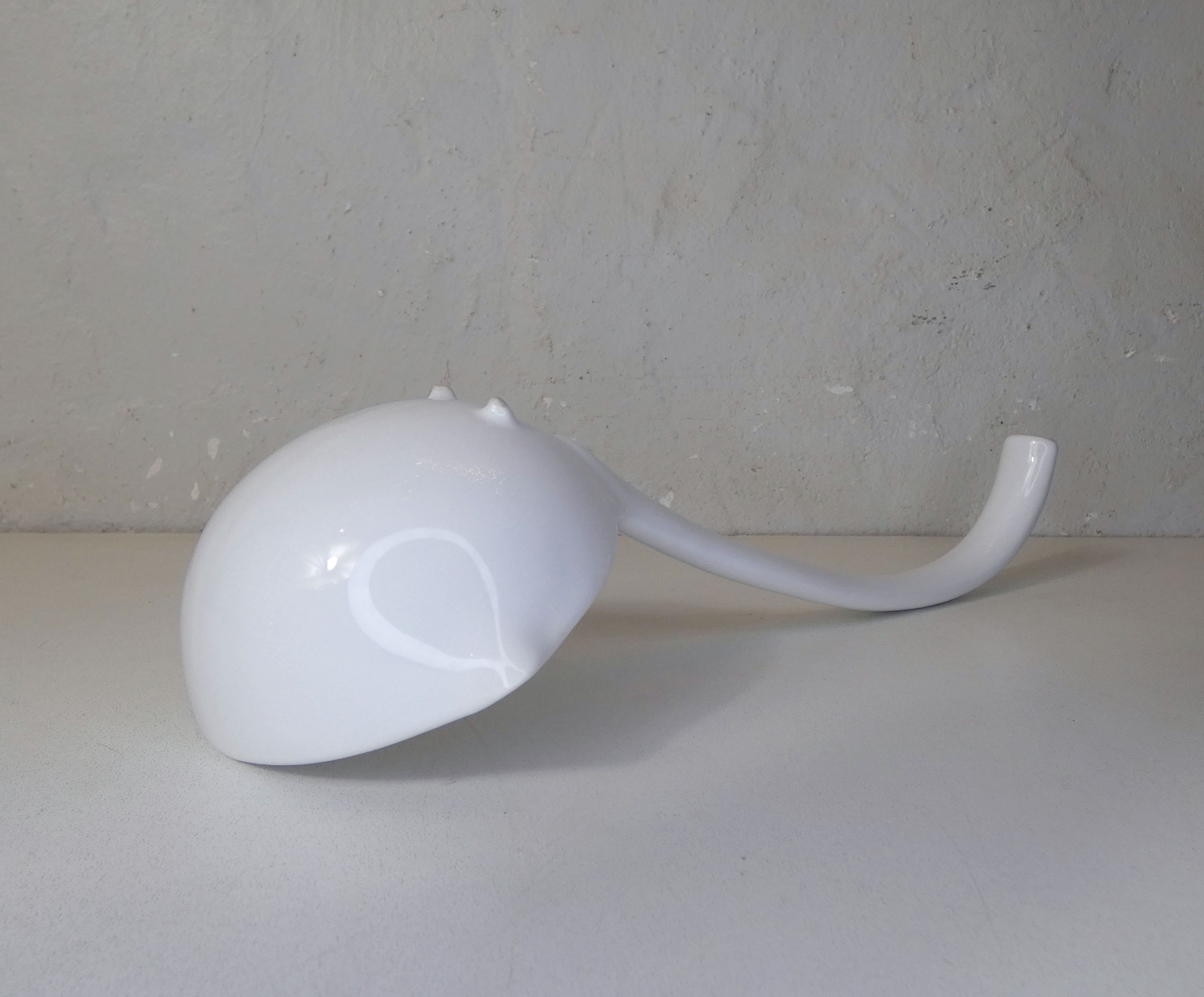 White ceramic ladle