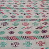White carpet with multicolored Berber patterns handmade