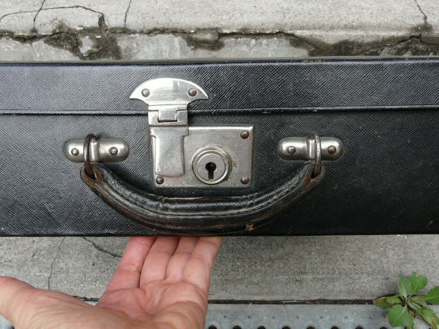 Leather suitcase with baron's crown and mw monogram