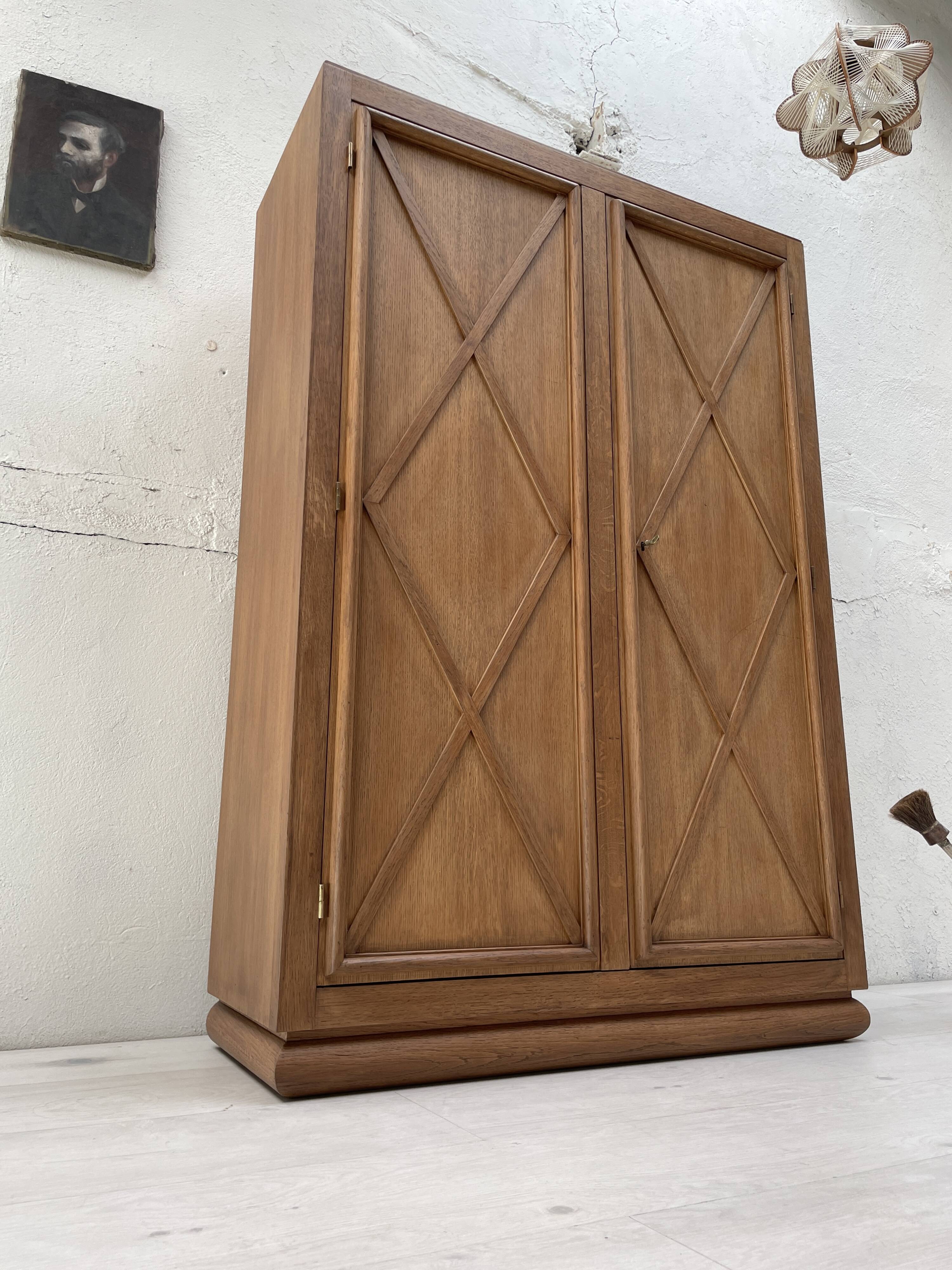 Storage unit in solid oak and veneer, circa 1960.
