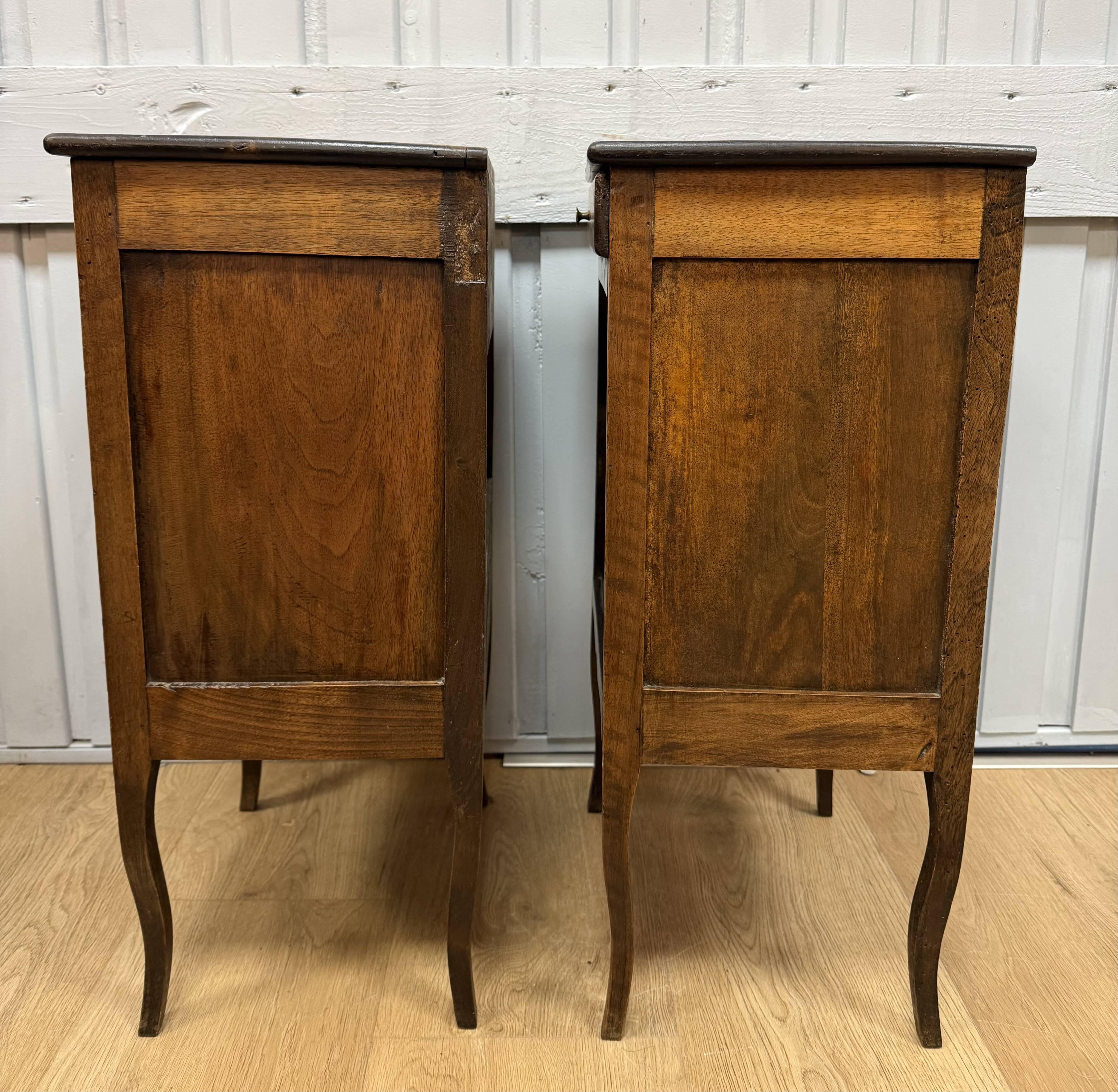 Pair of walnut bedside tables