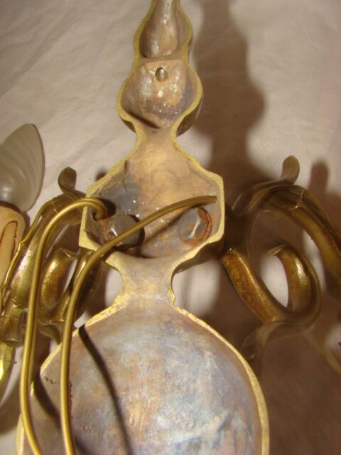 Pair of bronze wall lights with 2 arms in "Dutch" style.
