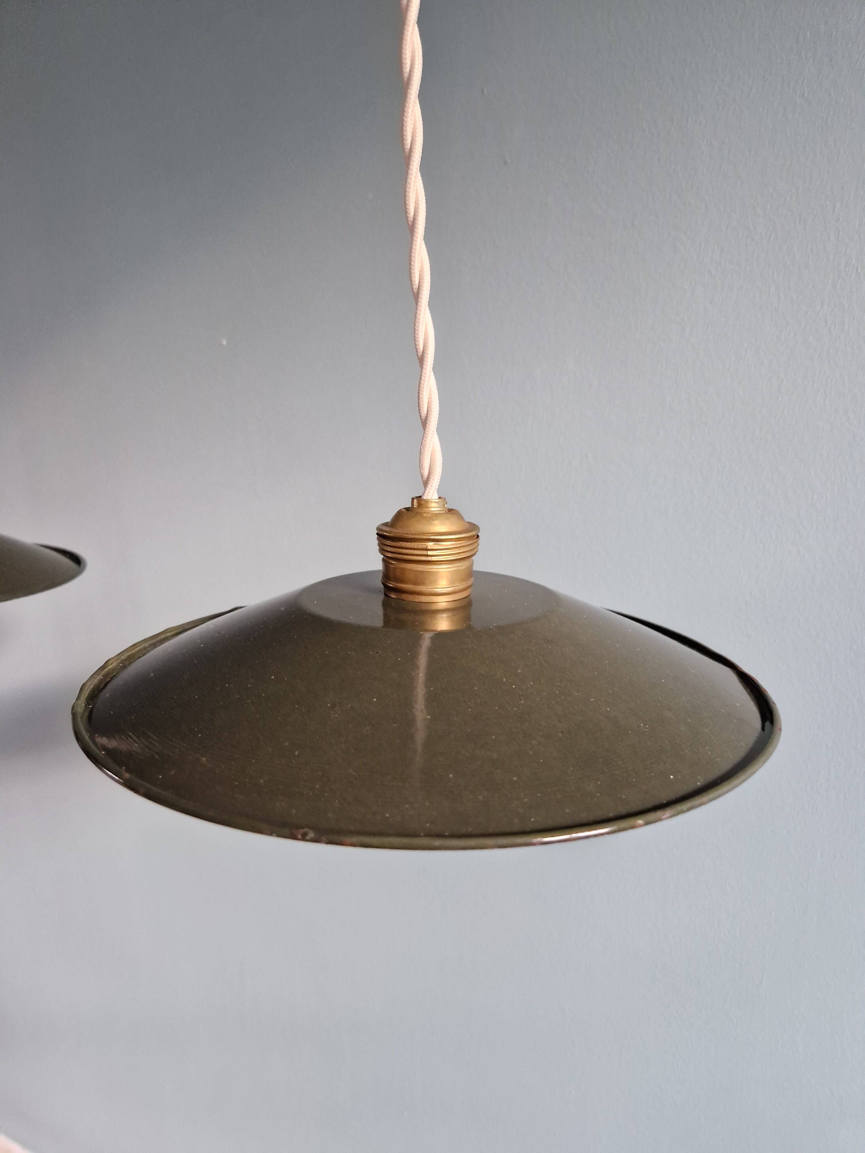 Pair of industrial pendant lights in olive green enameled sheet metal