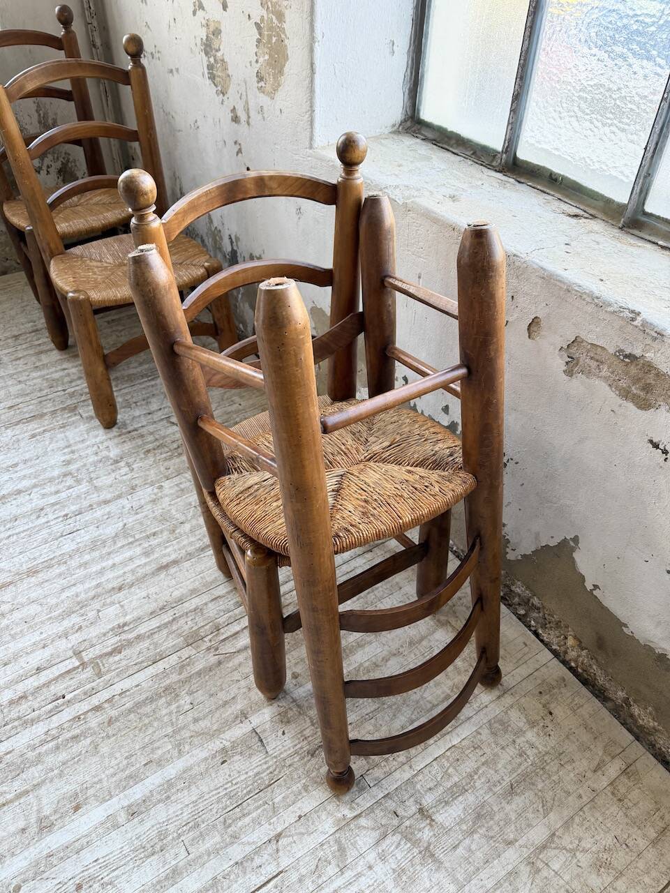 Set of 4 oak and straw chairs Dudouyt 1940
