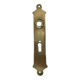 Door handle plate with brass keyhole