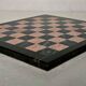 Small chessboard in coral marble and black marble - Italy - Second half of the twentieth century