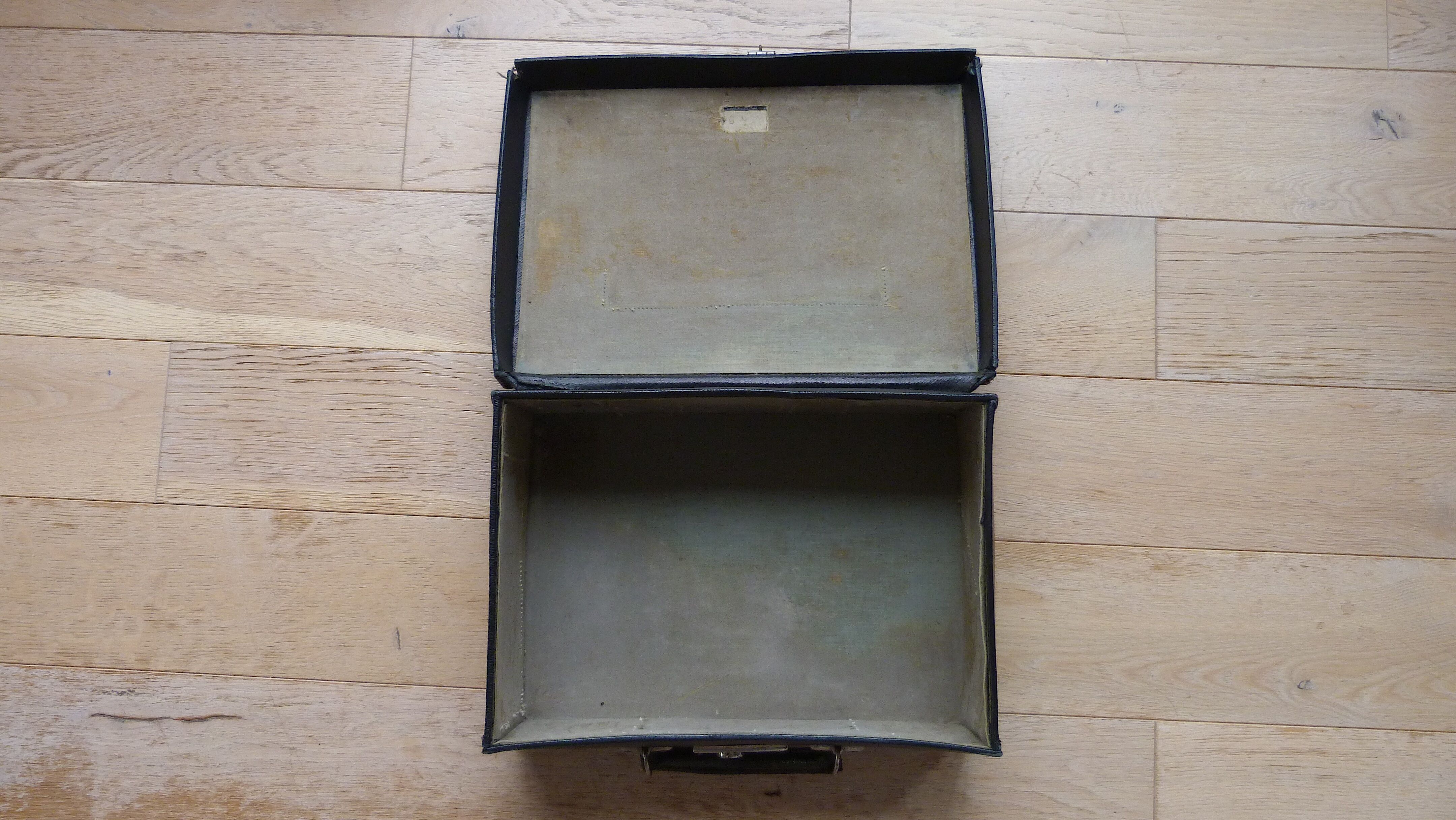 Old black suitcase