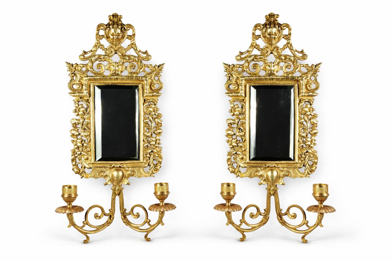 Pair of Napoleon III wall sconces in gilded bronze, with bevelled mirrors.