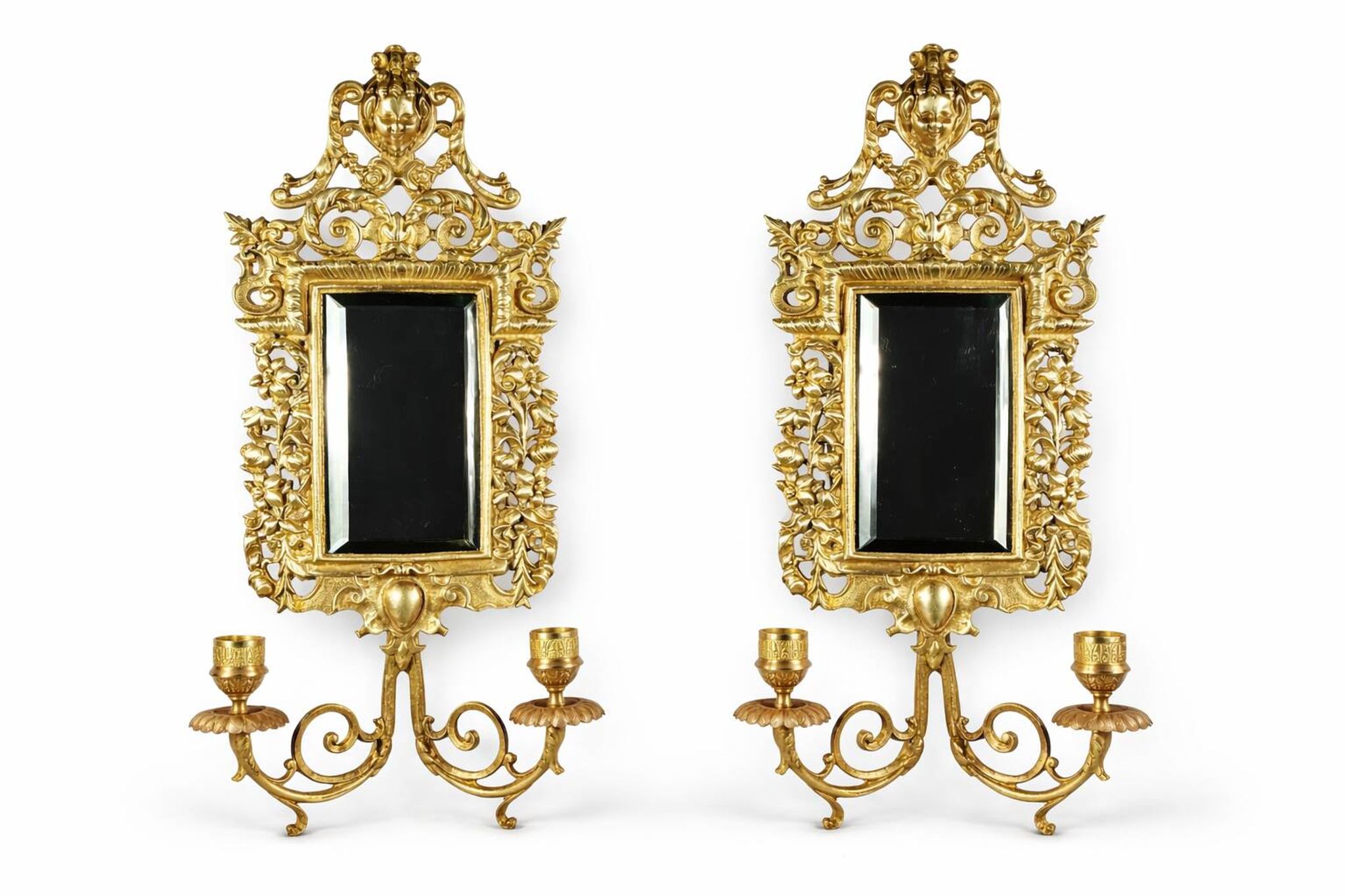 Pair of Napoleon III wall sconces in gilded bronze, with bevelled mirrors.