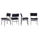 Set of four entirely black Hulmefa dining chairs, Architectural Modernism.