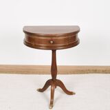 Pedestal table or small side table with drawer.
