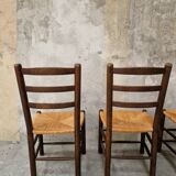 4 wooden and straw chairs