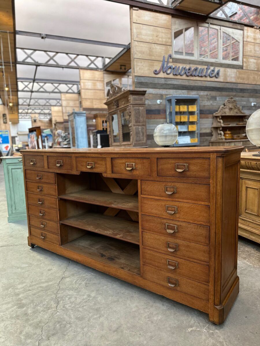 Early 20th-century oak hardware counter