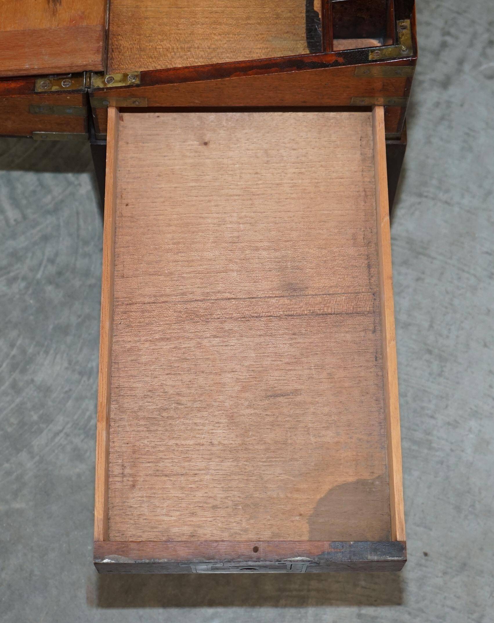 Antique hardwood military campaign desk with writing slope.