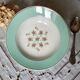 Old hollow plates mismatched in earthenware