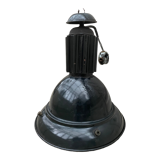 Black industrial pendant light in enameled sheet metal