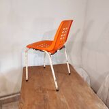 Chair with openwork plastic shell 1970