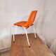 Chair with openwork plastic shell 1970