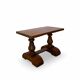 A small, rustic walnut wooden table, crafted from solid walnut wood, 1