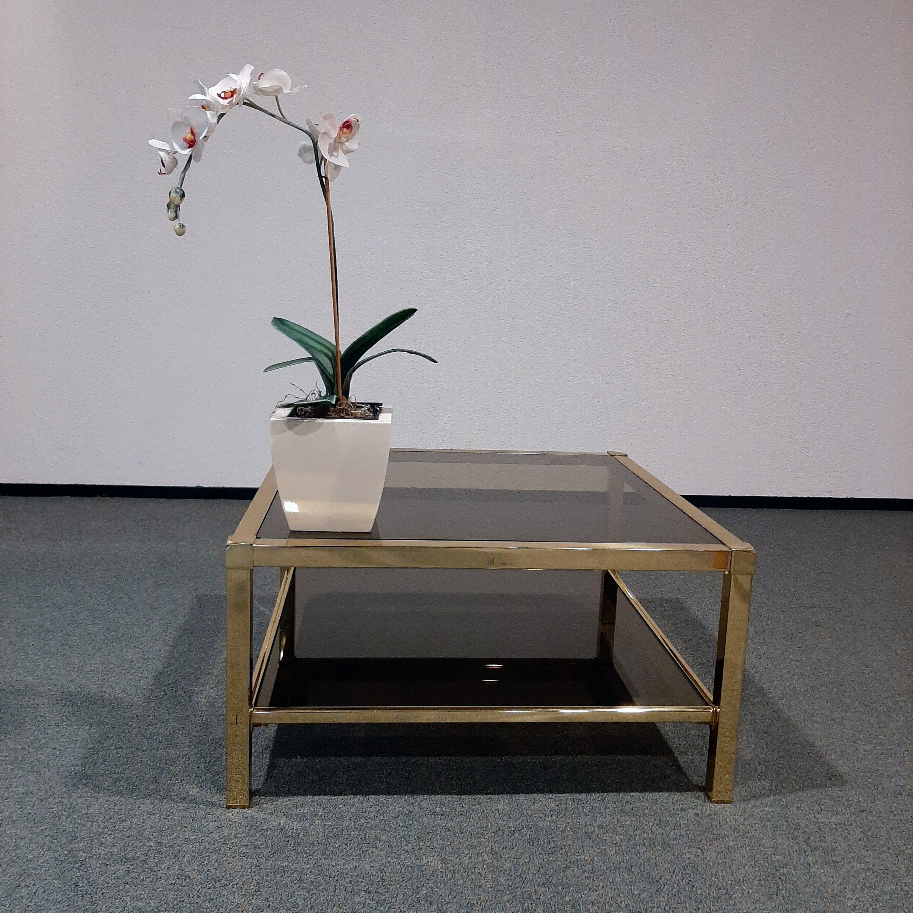 Vintage coffee table in smoked glass and brass 1970