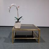 Vintage coffee table in smoked glass and brass 1970