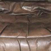 Westnofa patinated leather lounge chair with footrest, Norway 1960s
