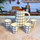Tisslit glass, handcrafted with a black and white checkered pattern.
