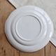 Vintage round white porcelain serving dish with handles.