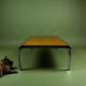 Vintage 1970s coffee table in chrome and burl wood.