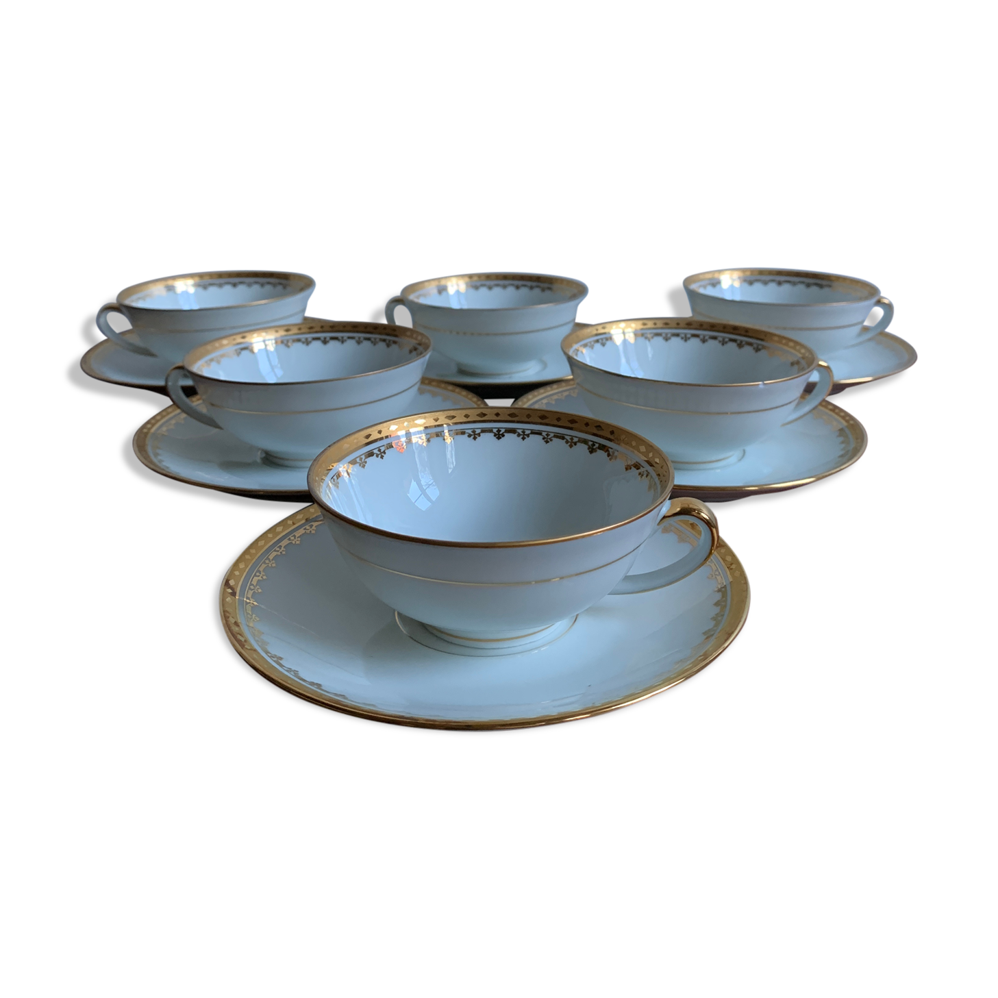 6 cups and golden porcelain saucers