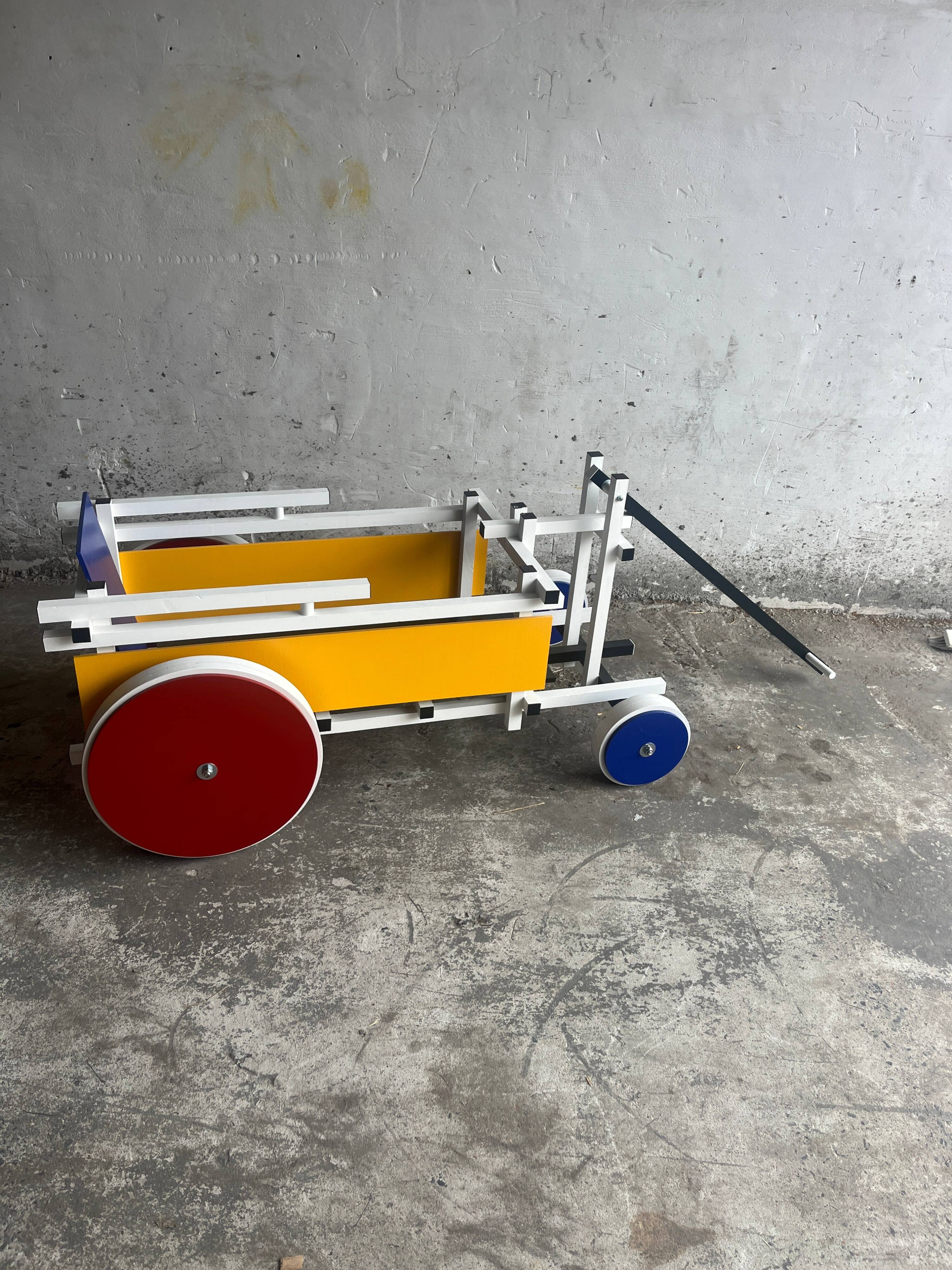 Rietveld-style De Stijl handcart in painted wood — white frame with red, blue, yellow accents
