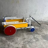 Rietveld-style De Stijl handcart in painted wood — white frame with red, blue, yellow accents
