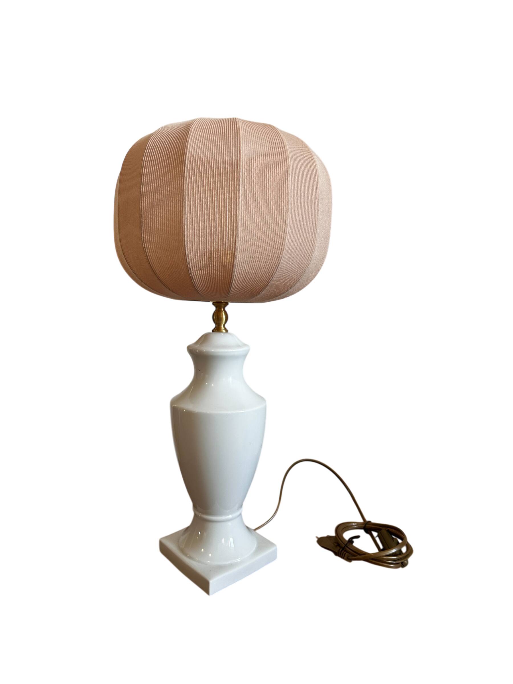 White ceramic table lamp with pastel shade