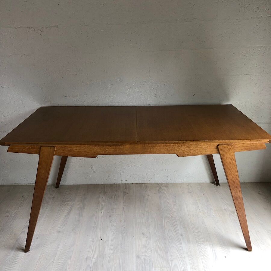 Dining table by Gérard Guermonprez by Magnani (1957)