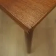 Danish teak extending dining table on solid wood legs, 1970s