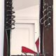 Brutalist mirror in metal and set glass
