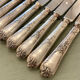Series of 12 silver metal table knives, Ercuis Goldsmith
