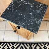Furniture in raw wood and black marble