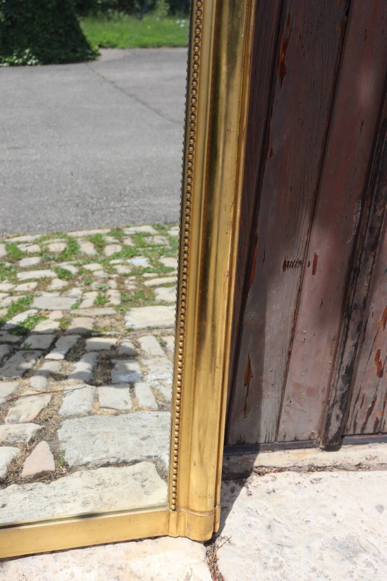 Large gold mirror in Louis XV style