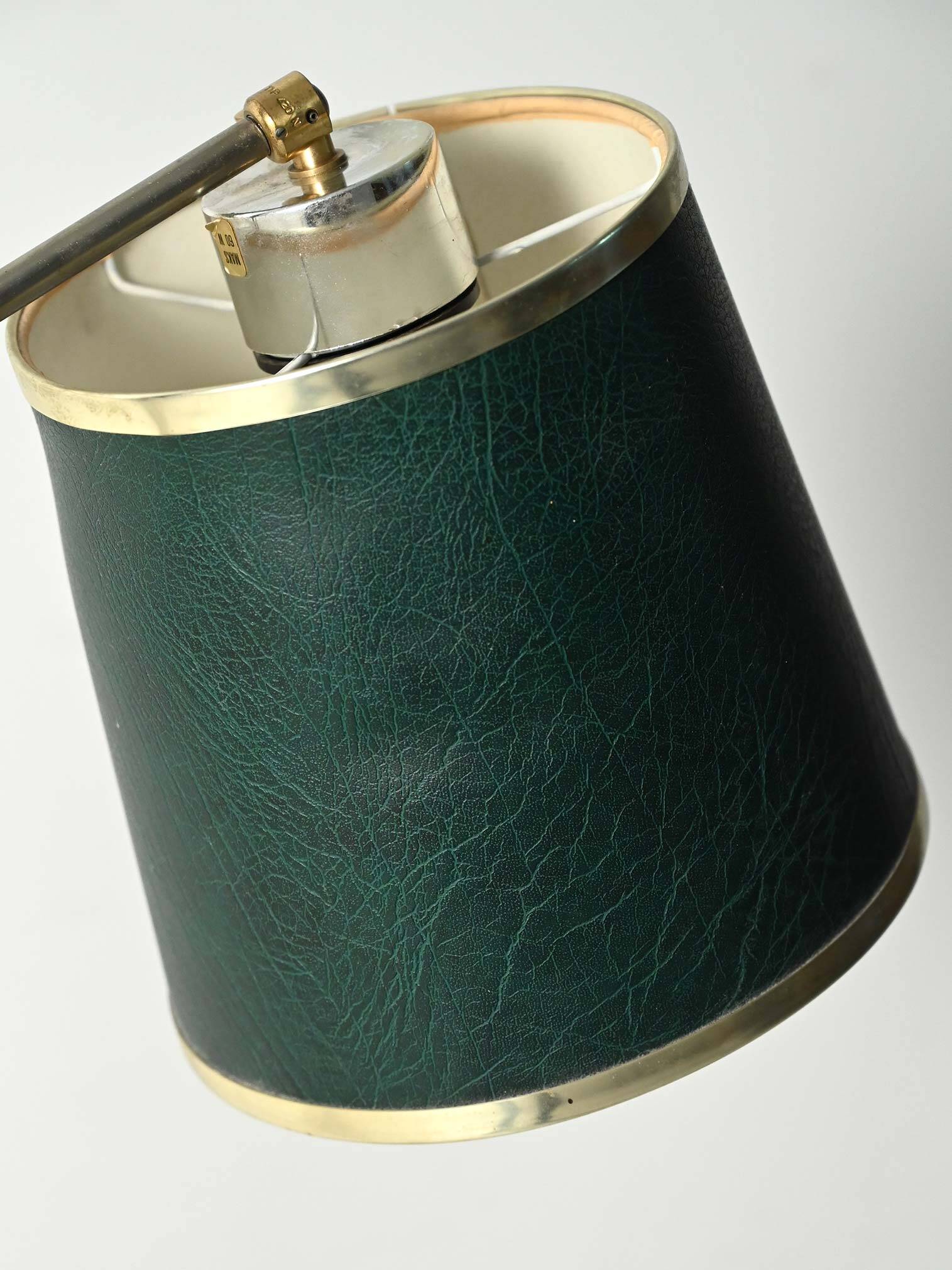 Brass floor lamp with green leather