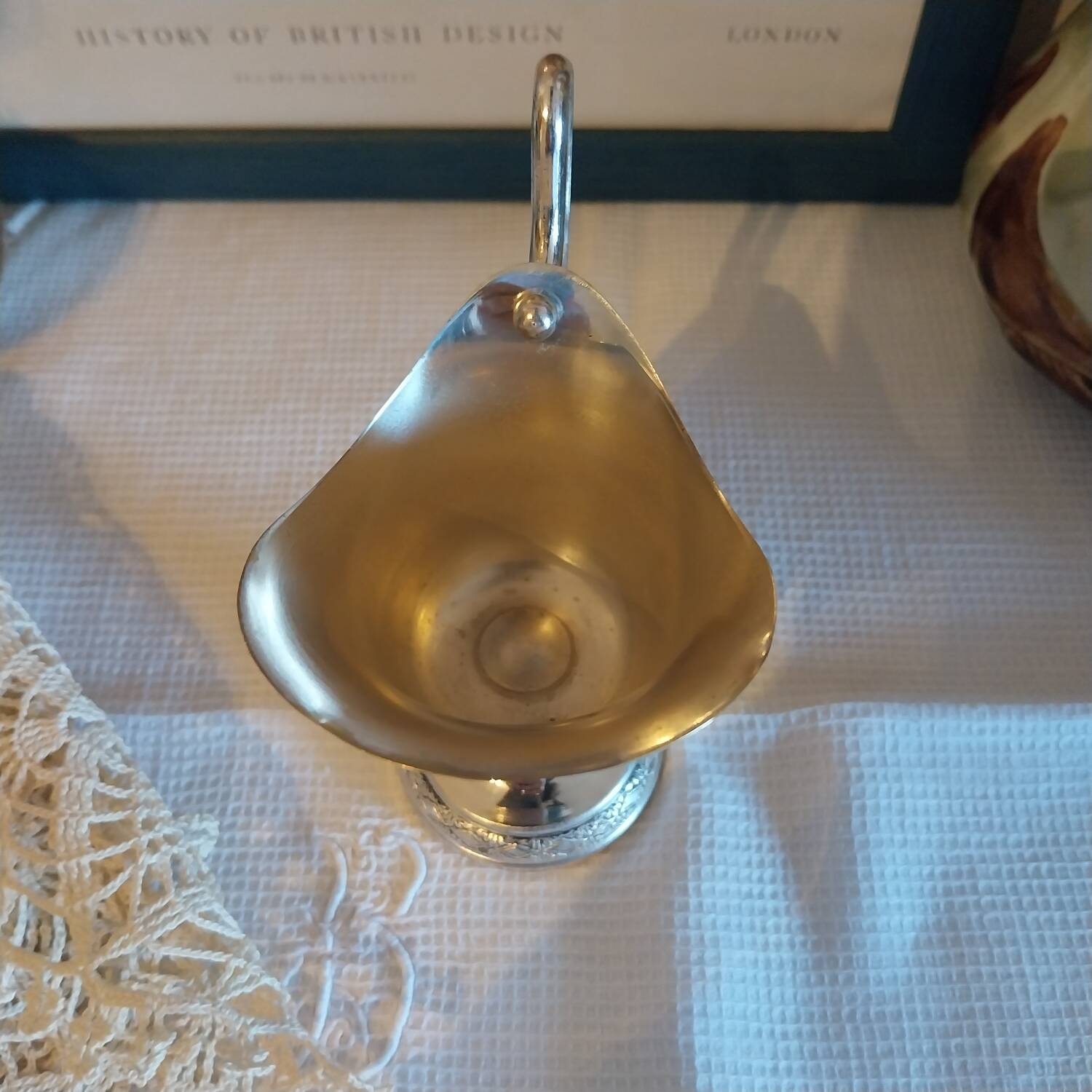 Old silver-plated milk jug