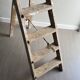 Former stepladder of patinated wood painter