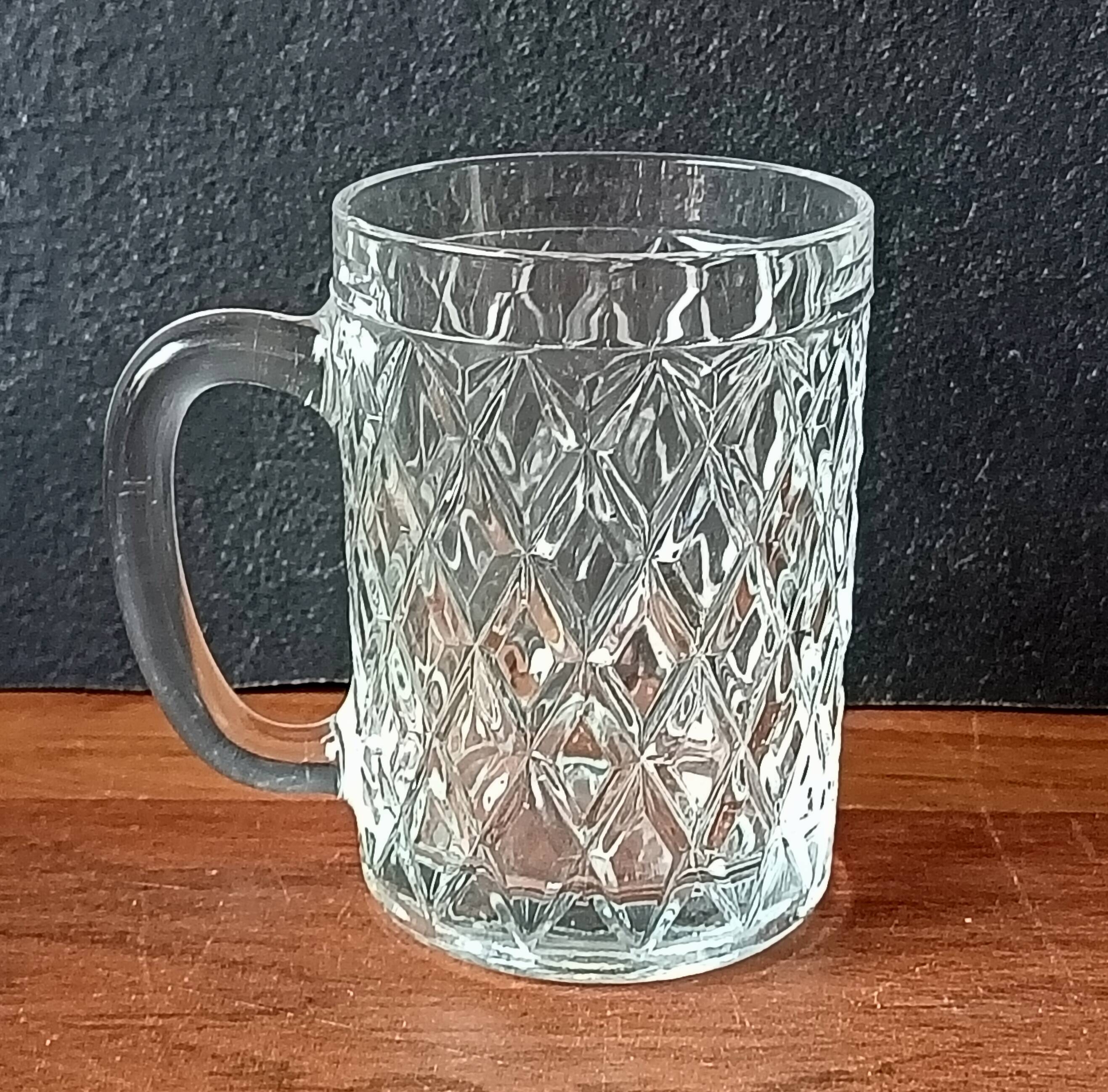 4 vintage beer mugs with a nice design in thick glass, old pint 30 cl.