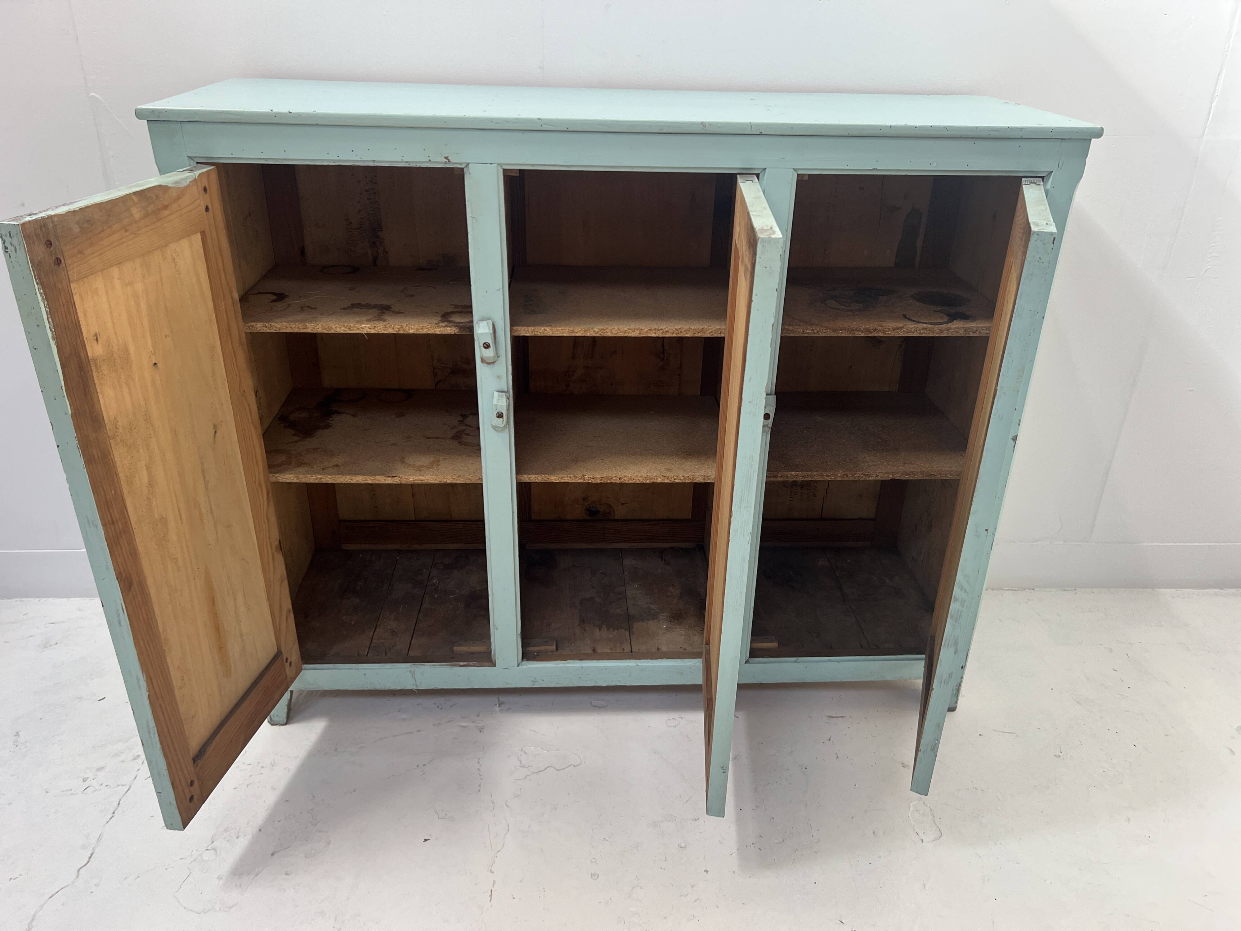 Parisian buffet with three doors in patinated beech, 20th century.
