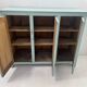 Parisian buffet with three doors in patinated beech, 20th century.