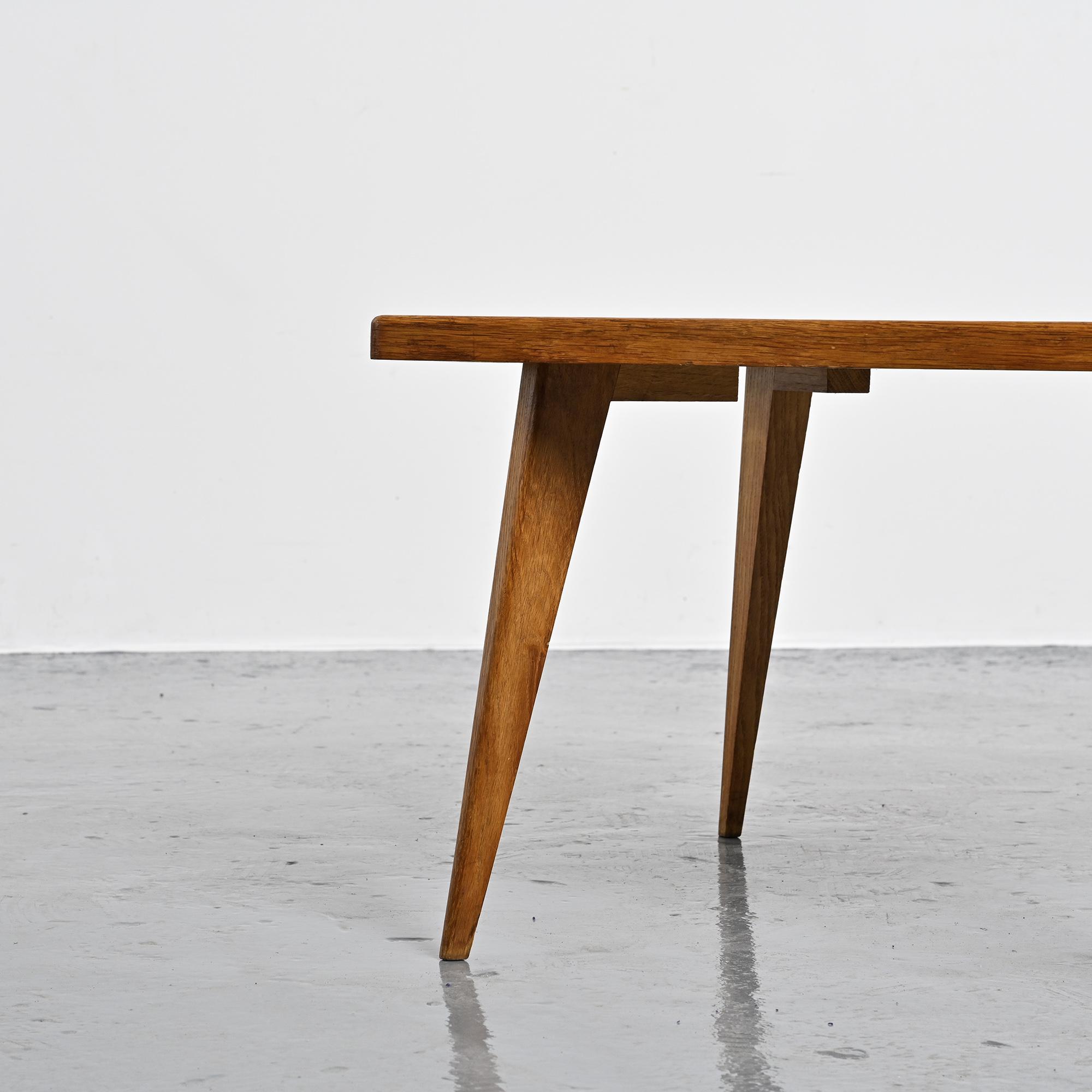 Coffee table with tapered legs, France, circa 1950-1960.