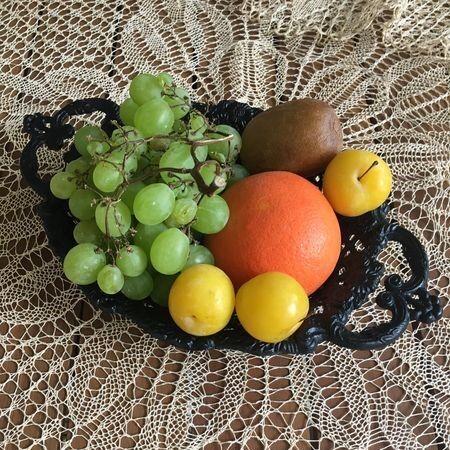 Fruit basket or bread in metal worked lace effect. Black color