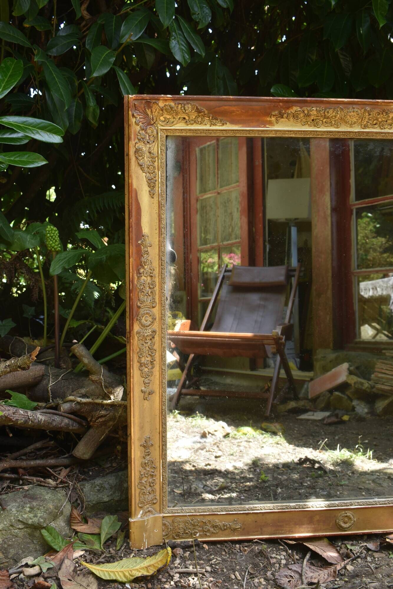 Large gilded Empire mirror from the 19th century.