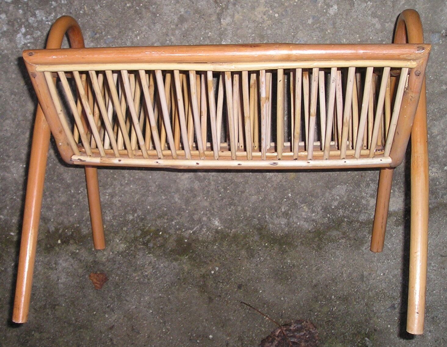 Magazine rack Wicker rattan of the 1970s vintage