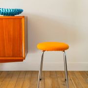 Chrome and boiled wool stool, orange, 1970.